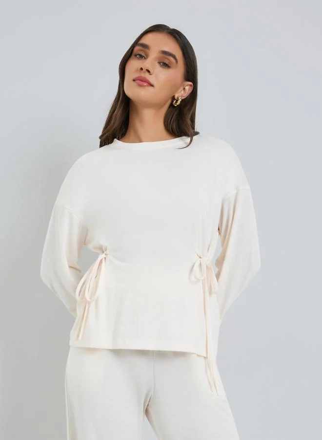 Styli Women Beige Side-Tie Top and Wide Leg Joggers Co-Ords